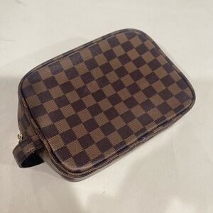 Brown Cosmetic Bag with Checkered Pattern and Zipper Closure